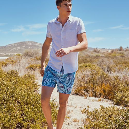 patterned shorts and button up outfit