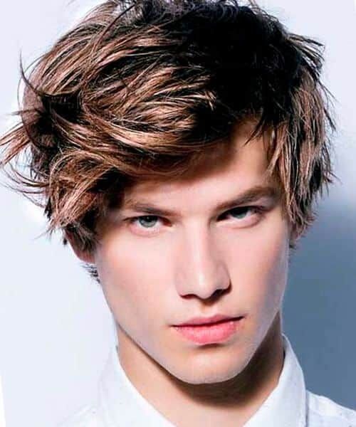 messy side sweep hairstyles for teenage guys