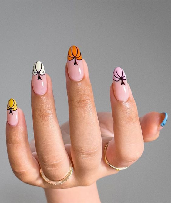 pumpkin french tip fall nail designs for teens
