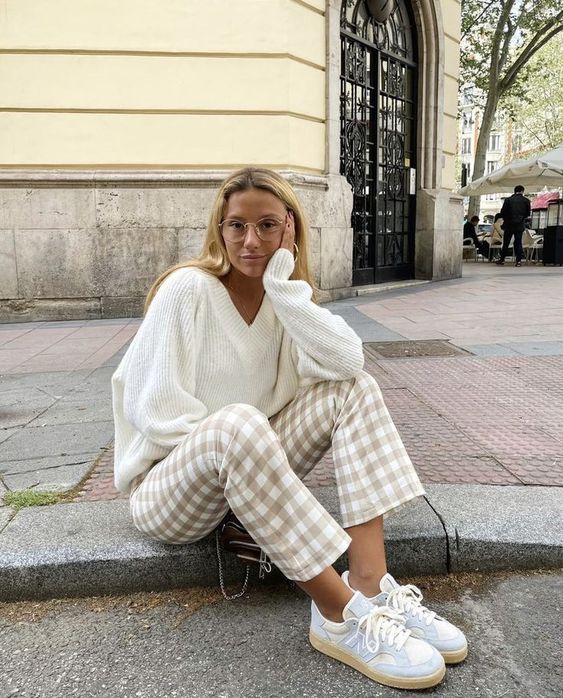 checkered pants and sweater