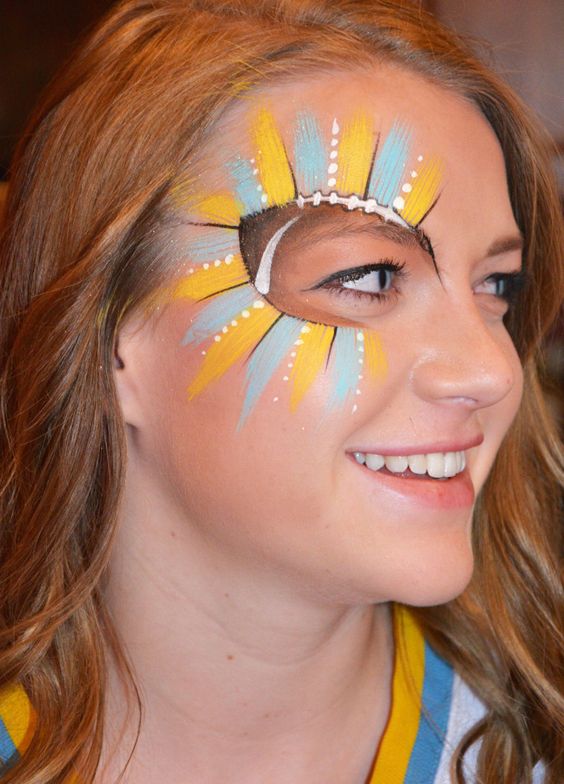 blue and yellow game day face paint