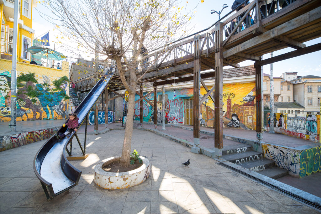 Playing on Metal Playground Equipment Over Concrete