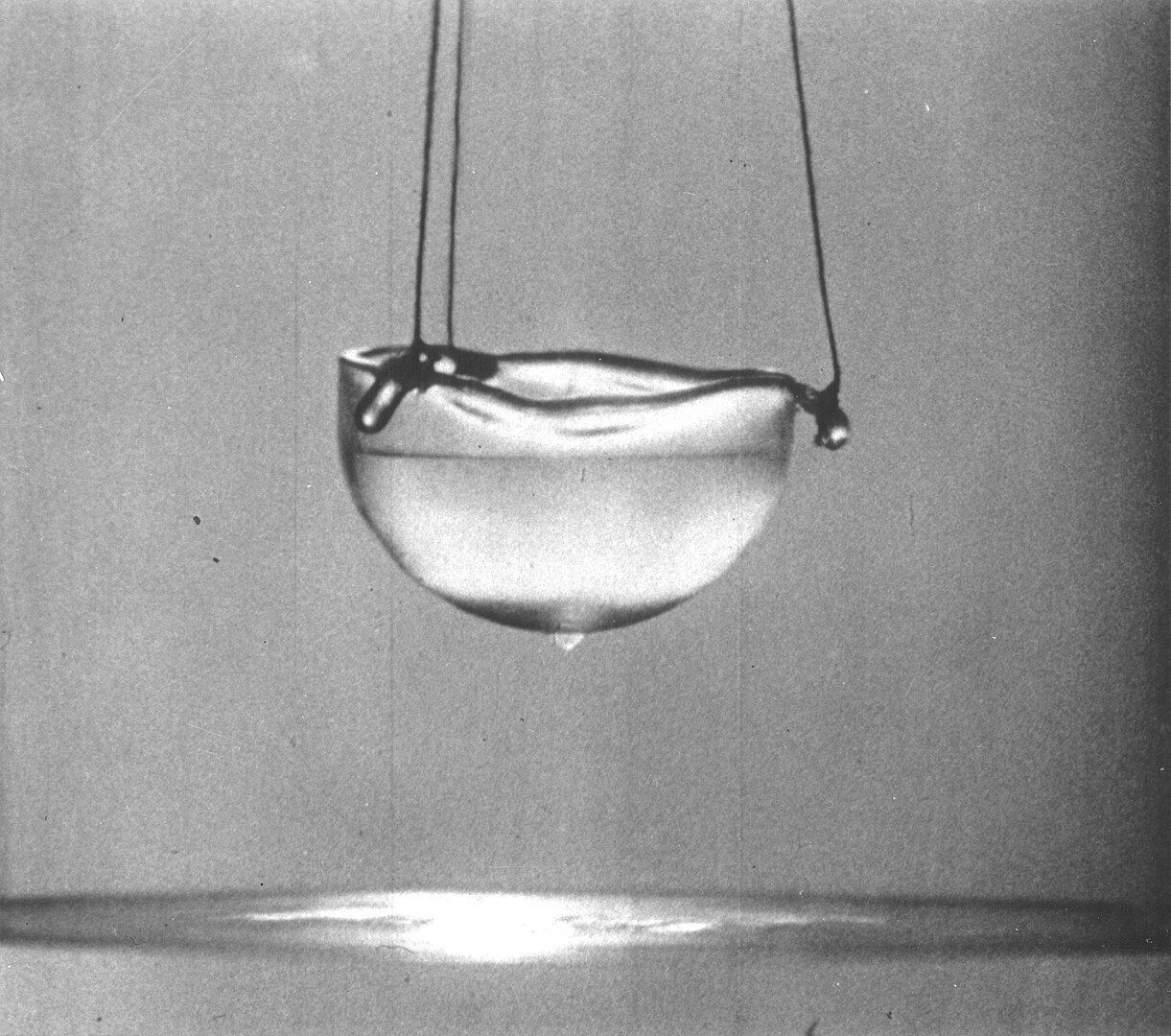 Superfluid Helium Climbs Walls