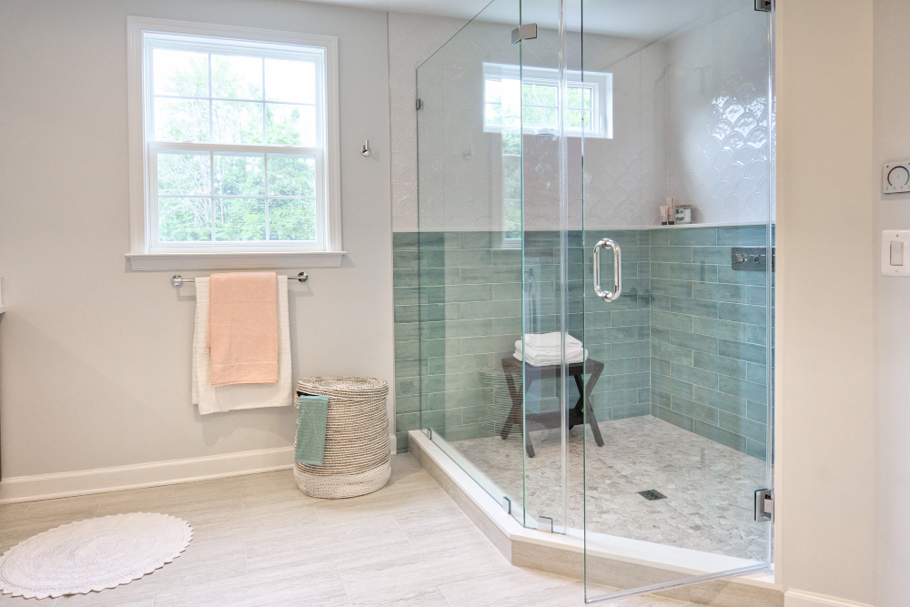 Framed Chrome Shower Doors and Tiny Beige Tile