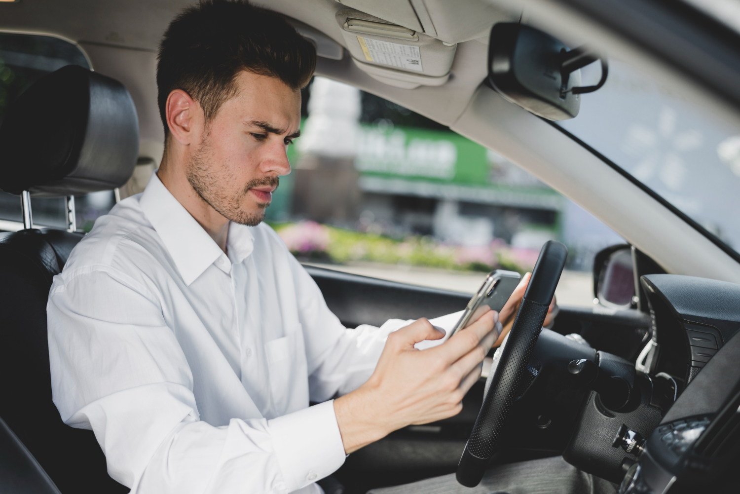 Holding a Phone While Driving