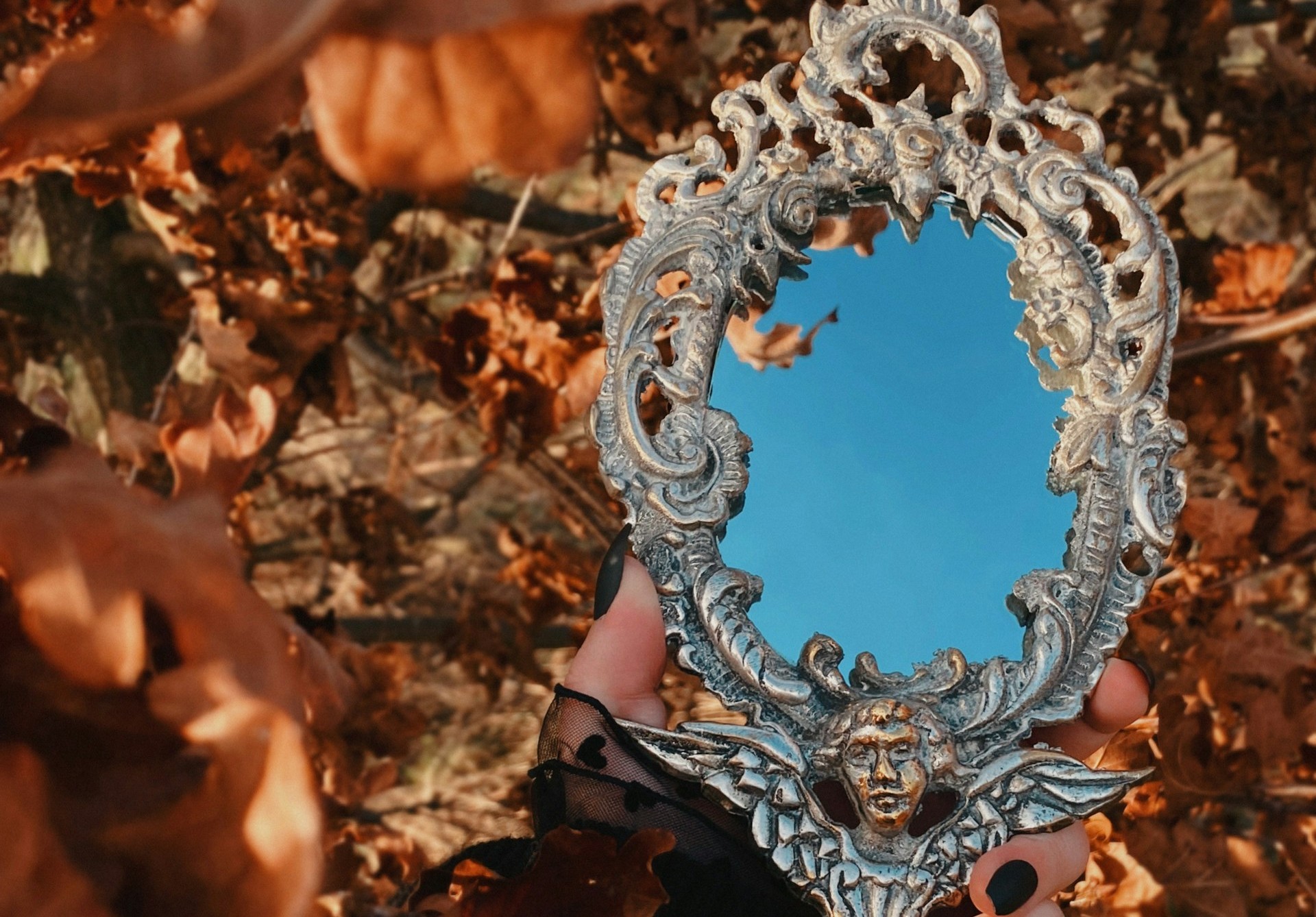 Mirror Watch Between Two Candles