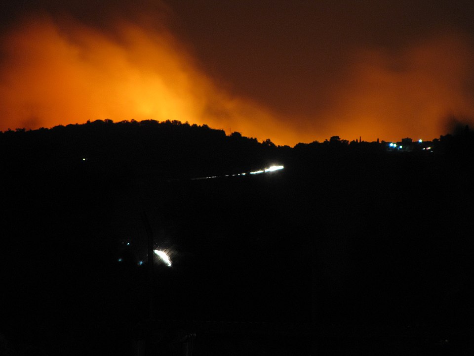 Greece Framed By Flame And Smoke